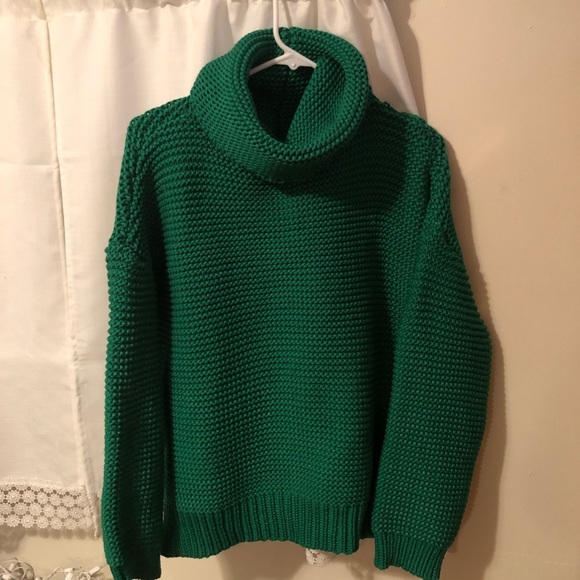 green turtleneck sweater